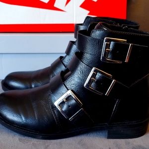 Black buckle ankle boots
